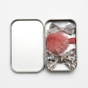TIN OF BOWS