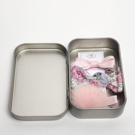 TIN OF BOWS
